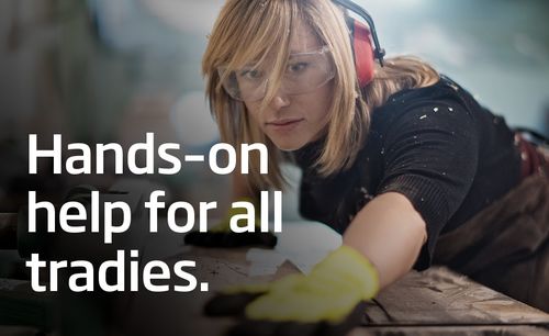 Female tradie promoting hands on help for all tradies