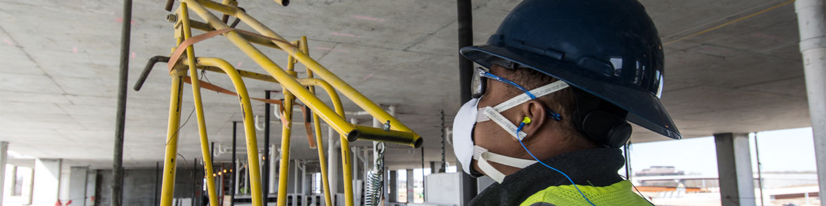 Man in protective face mask looking to the left