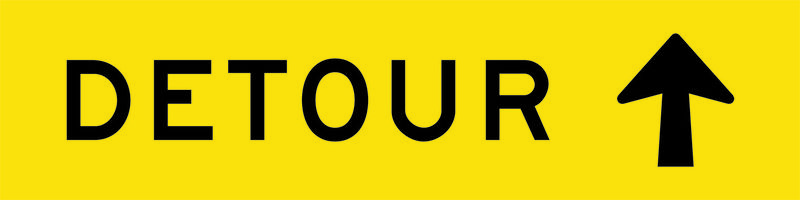 A yellow and black Detour Ahead Sign