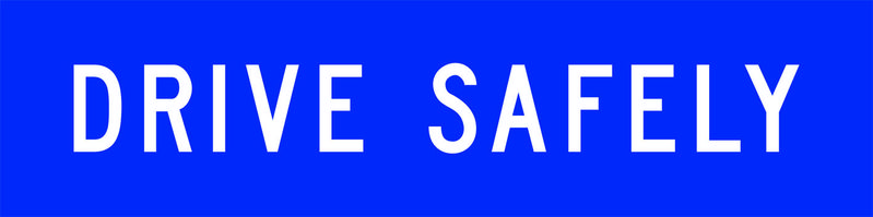 A blue and white Drive Safely Sign