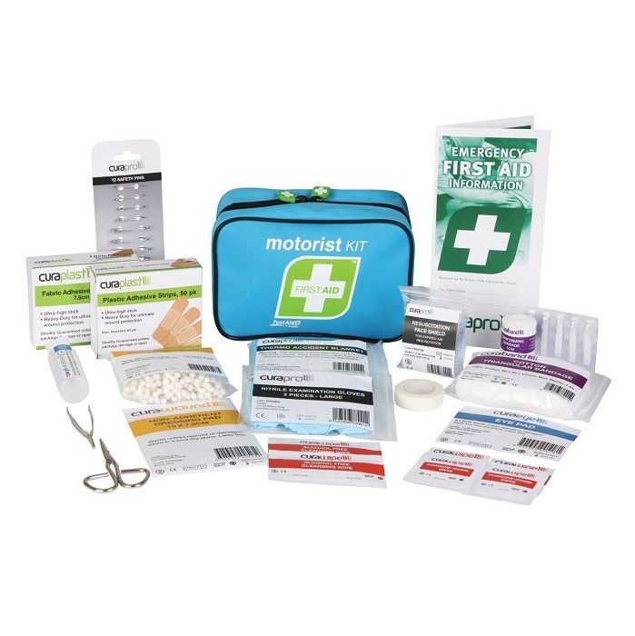A motorist first aid kit with the contents displayed