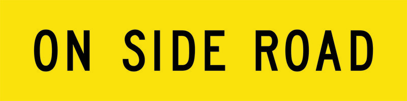 A yellow and black On Side Road Sign