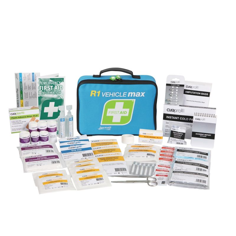 A first aid kit with the contents displayed