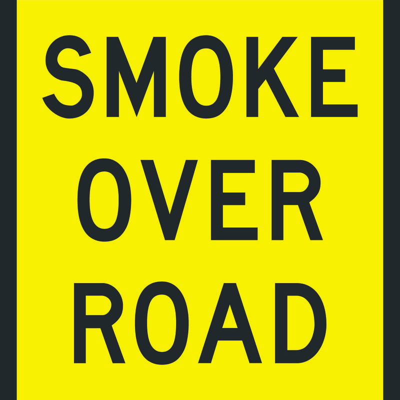 Smoke Over Road Sign