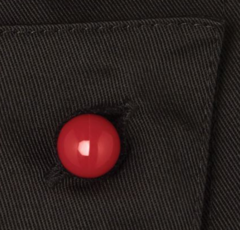 Close up of a red Chef+39s Button
